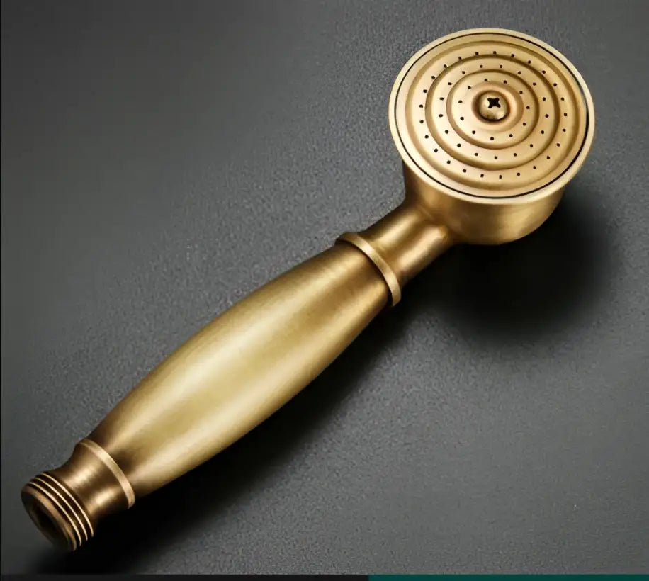 Brass-finished decorbites antique bathroom handheld shower head with circular spray face and textured grip handle for high pressure rainfall