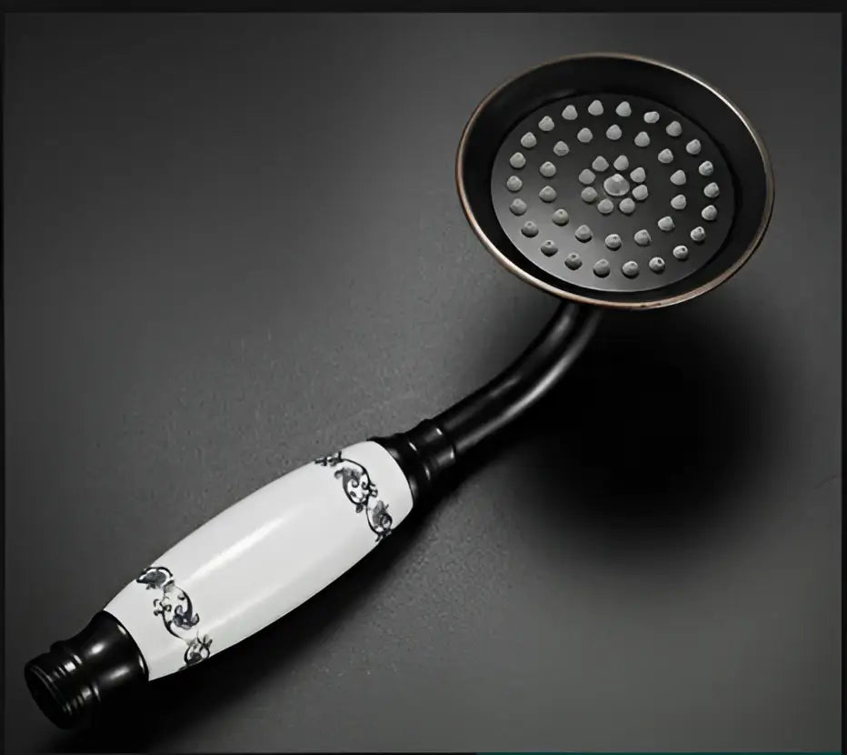 Decorbites antique bathroom handheld shower head with black and white ceramic and ornate floral handle detailing