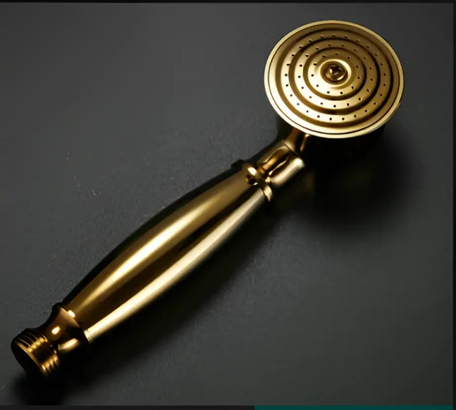 Gold-colored brass decorbites antique bathroom handheld shower head with circular textured face and elongated handle for high pressure rainfall