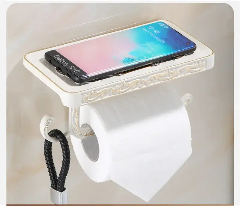 Decorbites™ antique black toilet paper holder with sleek rectangular shelf holding a black samsung galaxy s10 phone