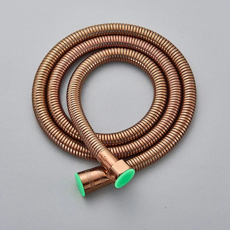 DecorBites antique brass 59 inch copper-colored flexible hand shower hose with ribbed texture and bright green end caps