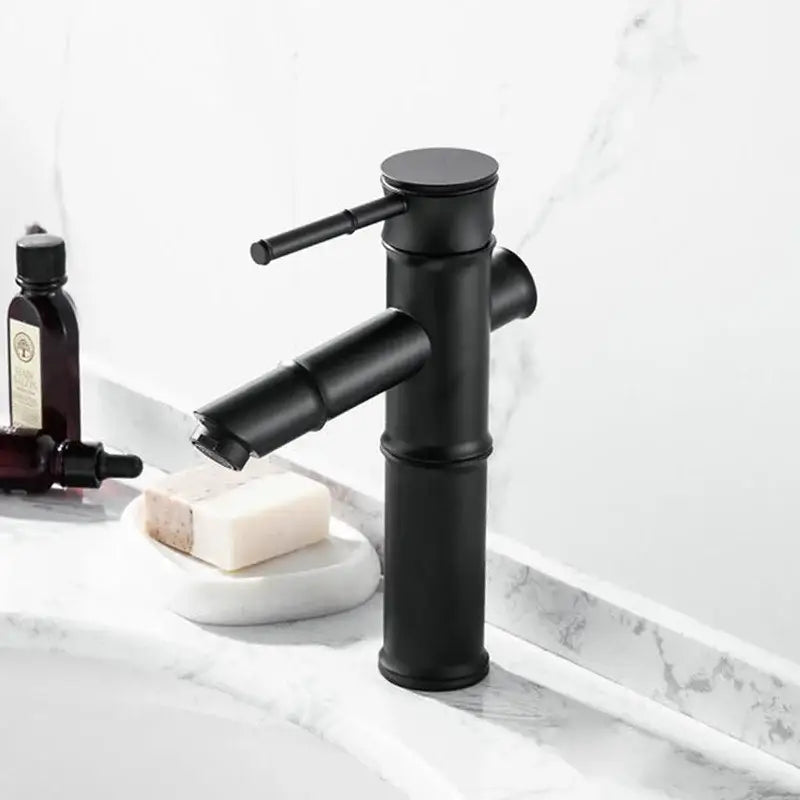 Black matte single handle bamboo-style faucet by DecorBites antique brass with sleek modern design for basin use