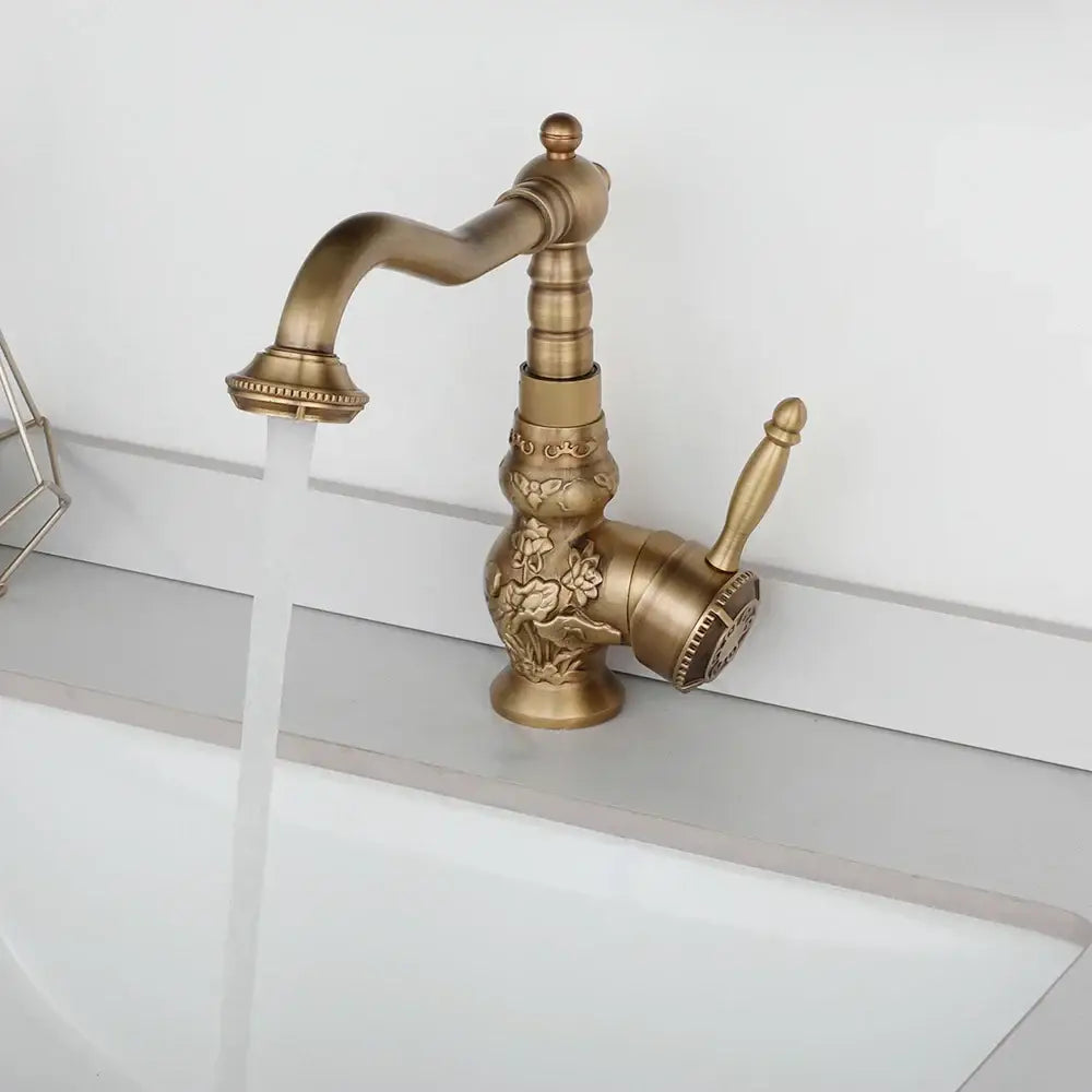 DecorBites antique brass basin faucet with ornate floral engraving and classic curved spout 360 rotation design