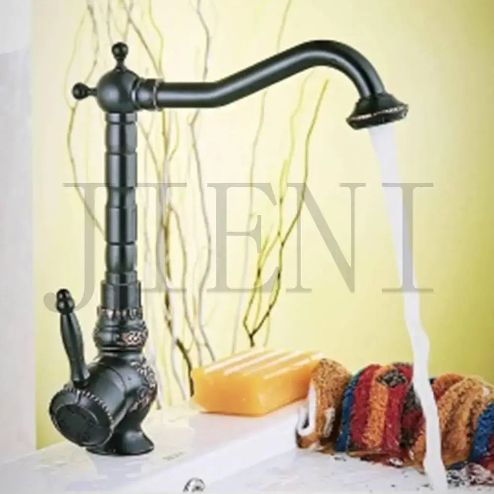 Black matte-finished decorbites antique brass basin faucet with ornate detailing and 360 rotation curved spout