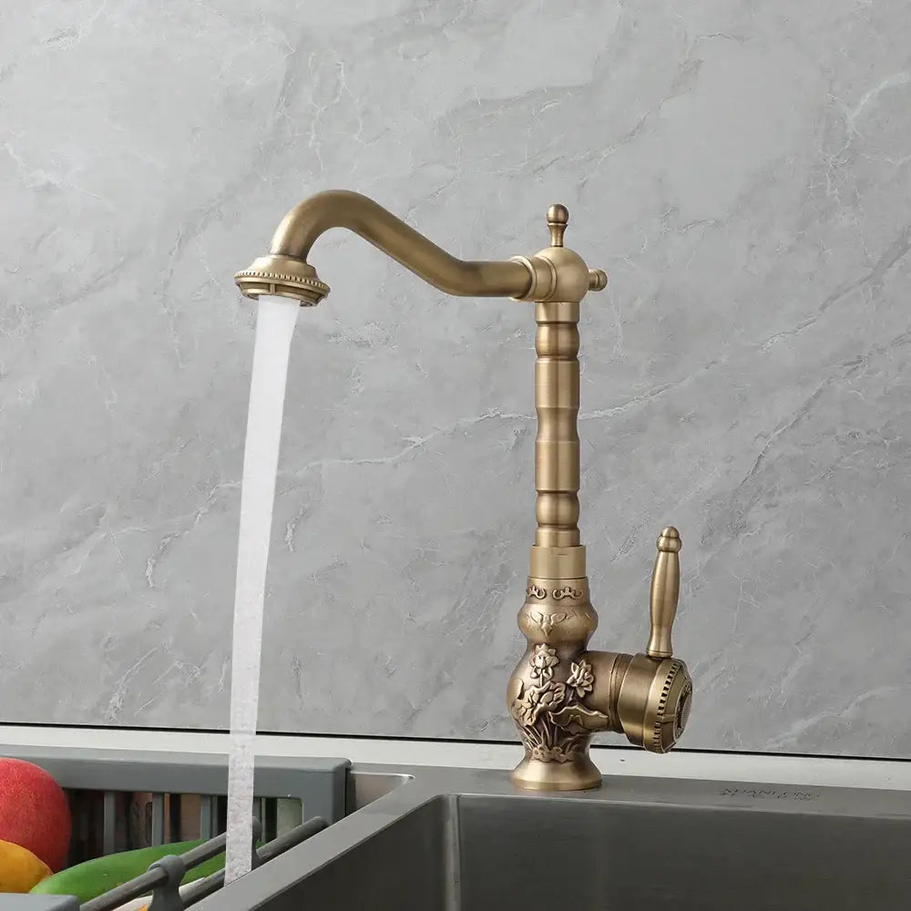 DecorBites antique brass basin faucet with ornate floral detailing and curved spout for kitchen use and 360 rotation design