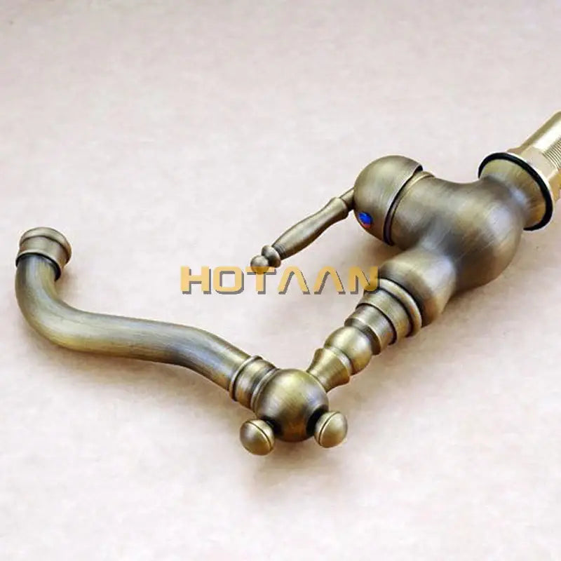 Antique brass basin faucet DecorBites™ YT-5047 with ornate vintage design and single lever handle for bathroom use