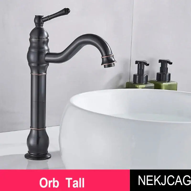 Decorbites antique brass basin faucet with black matte finish curved spout and ornate handle with copper accents