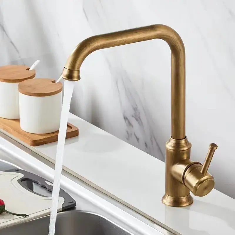 Decorbites antique brass basin faucet with curved spout and single lever handle for bathroom sink use