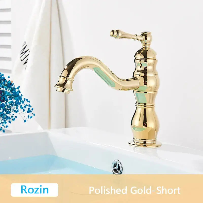 Polished gold antique brass basin faucet with classic ornate design and curved spout by DecorBites antique brass