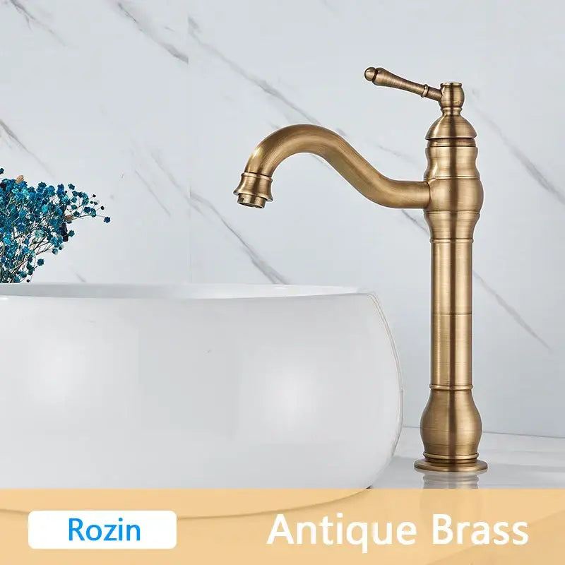 Decorbites antique brass basin faucet single handle bathroom mixer tap with classic ornate design and curved spout