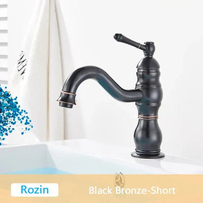 Black bronze decorbites antique brass basin faucet with curved spout and ornate segmented body for bathroom use