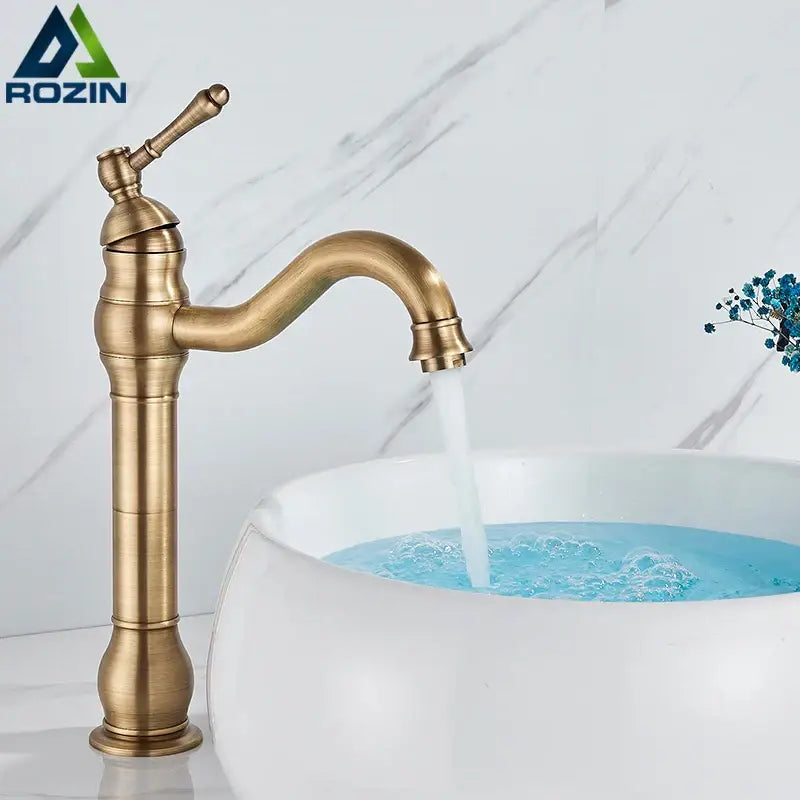Decorbites antique brass basin faucet single handle bathroom mixer tap with curved spout and ornate detailing