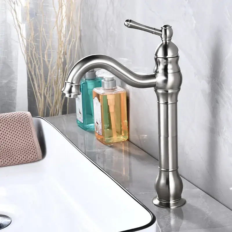 Stylish decorbites antique brass basin faucet single-handle mixer tap with elegant curved spout and decorative knob