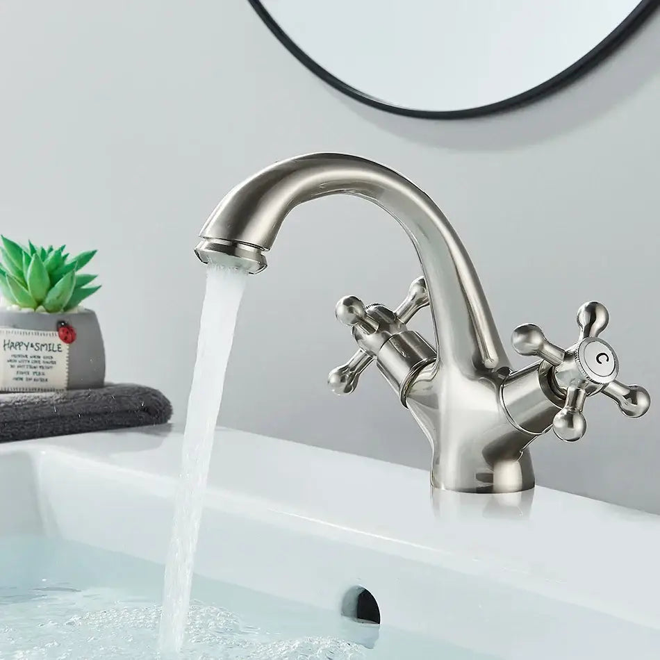 Decorbites antique brass basin faucet with stainless steel two-handle curved spout and cross-shaped knobs