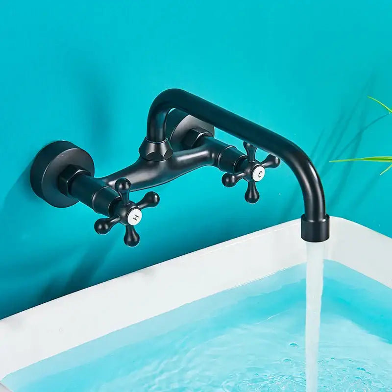 Black matte wall-mounted basin faucet with cross handles engraved h and c for hot and cold by decorbites antique brass
