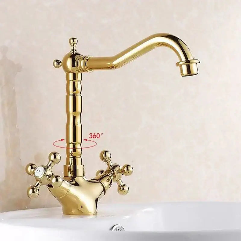 Decorbites antique brass basin faucet with gold finish, vintage-style curved swivel spout and ornate cross handles