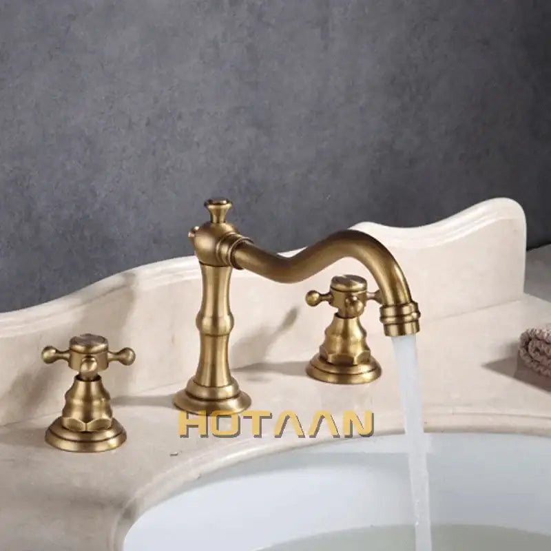 DecorBites™ antique brass basin mixer tap with dual ornate cross handles and curved spout deck mounted kitchen faucet