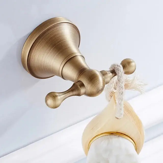 Decorbites antique brass bathroom accessory set double towel rack with textured finish and decorative spherical ends