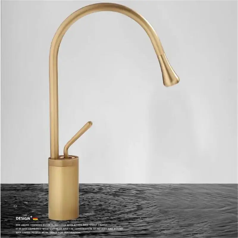 Brass bathroom basin faucet with antique brass finish, sleek curved spout, and cylindrical base for bathroom use