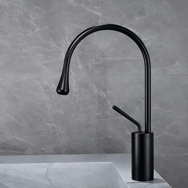 Black matte finish basin faucet with curved spout and cylindrical base for antique brass bathroom sink mixer