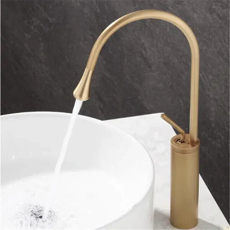 DecorBites™ antique brass bathroom basin faucet with brass finish curved spout and cylindrical base for sink mixer