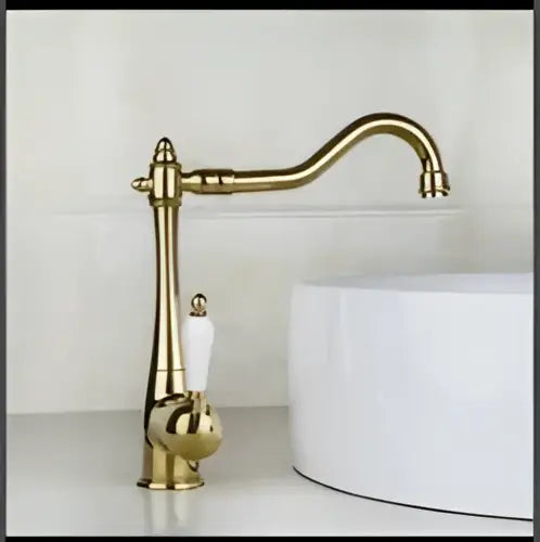 DecorBites antique brass bathroom faucet set with brass-finished curved spout and ornate detailing for elegant use