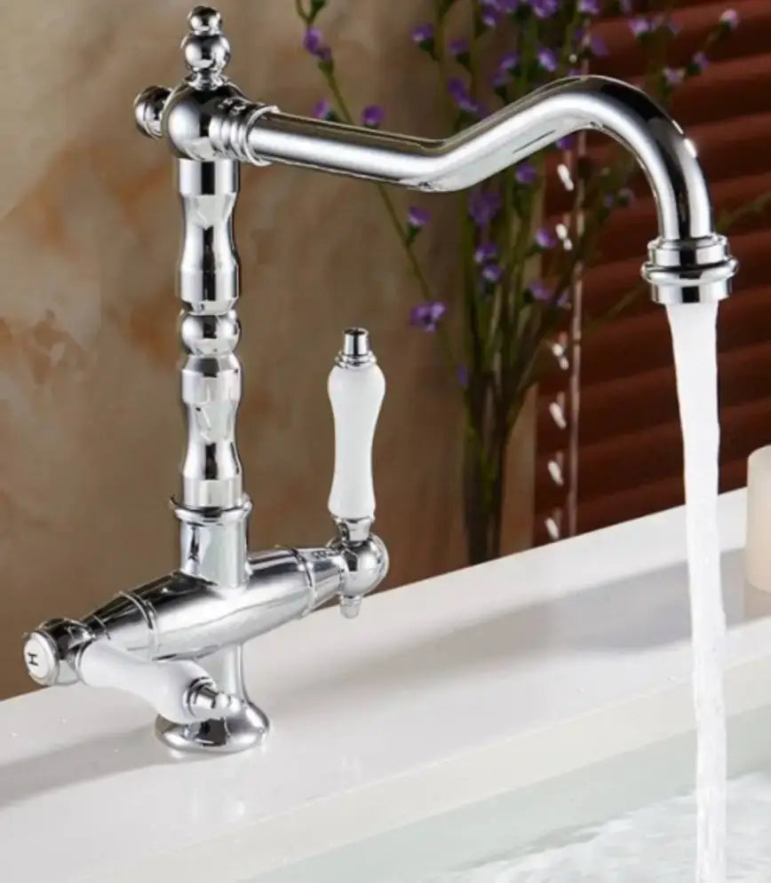 Chrome finished kitchen faucet with curved spout and white ceramic handles in decorbites antique brass bathroom faucet set