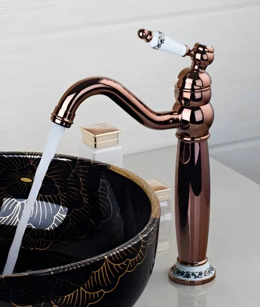 Decorbites antique brass bathroom faucet set with hand shower featuring rose gold faucet with white ceramic handle and ornate detailing