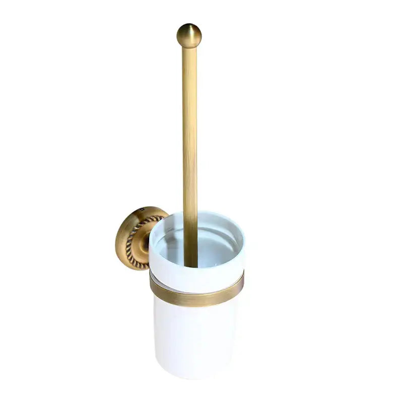White ceramic toilet brush holder with gold-toned accents and brass handle from decorbites antique brass bathroom hardware set