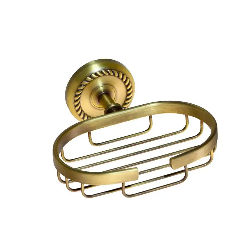 Antique brass bathroom hardware set featuring an oval soap dish with rope-textured wall mount by decorbites