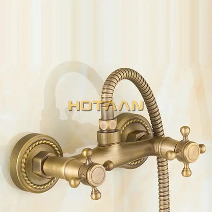 Decorbites antique brass bathroom wall-mounted basin tap set with ornate twisted rope detailing and two cross-handle knobs