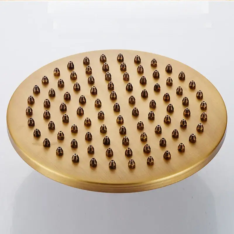 Round brushed gold showerhead with grid nozzles in decorbites antique brass shower mixer set with rainfall function