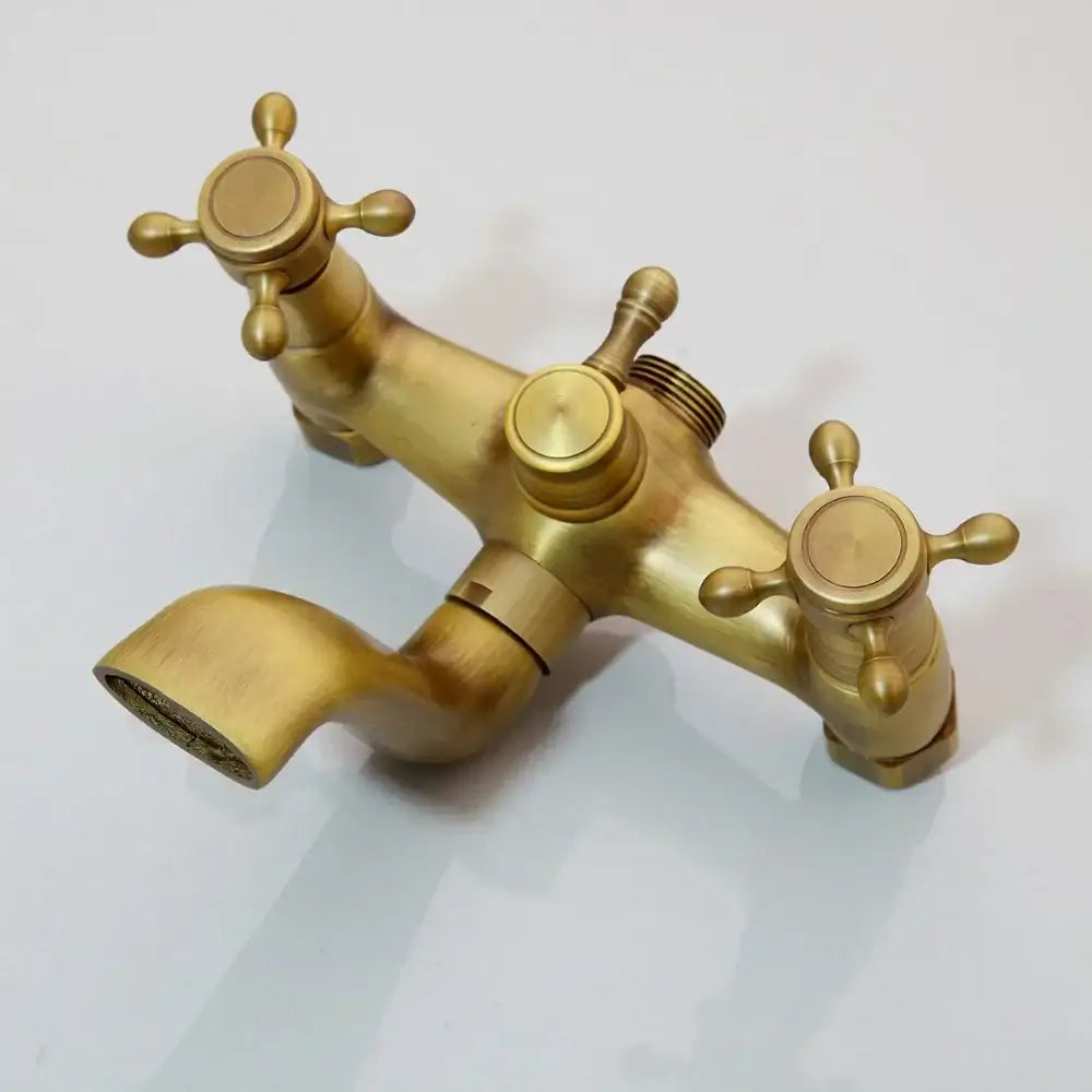 Brass-finished antique brass bathroom shower set faucet with three cross handles and curved spout by decorbites