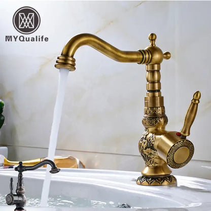 Decorbites antique brass bathroom sink faucet mixer with ornate vintage detailing and curved spout in brass bathroom sink