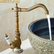 Decorbites antique brass bathroom sink faucet single handle deck mounted basin mixer with ornate segmented spout and ceramic base