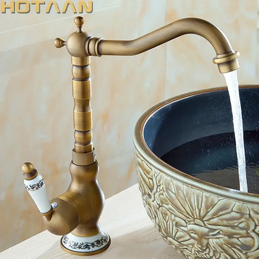 Decorbites antique brass bathroom sink faucet single handle deck mounted basin mixer with ornate segmented spout and ceramic base