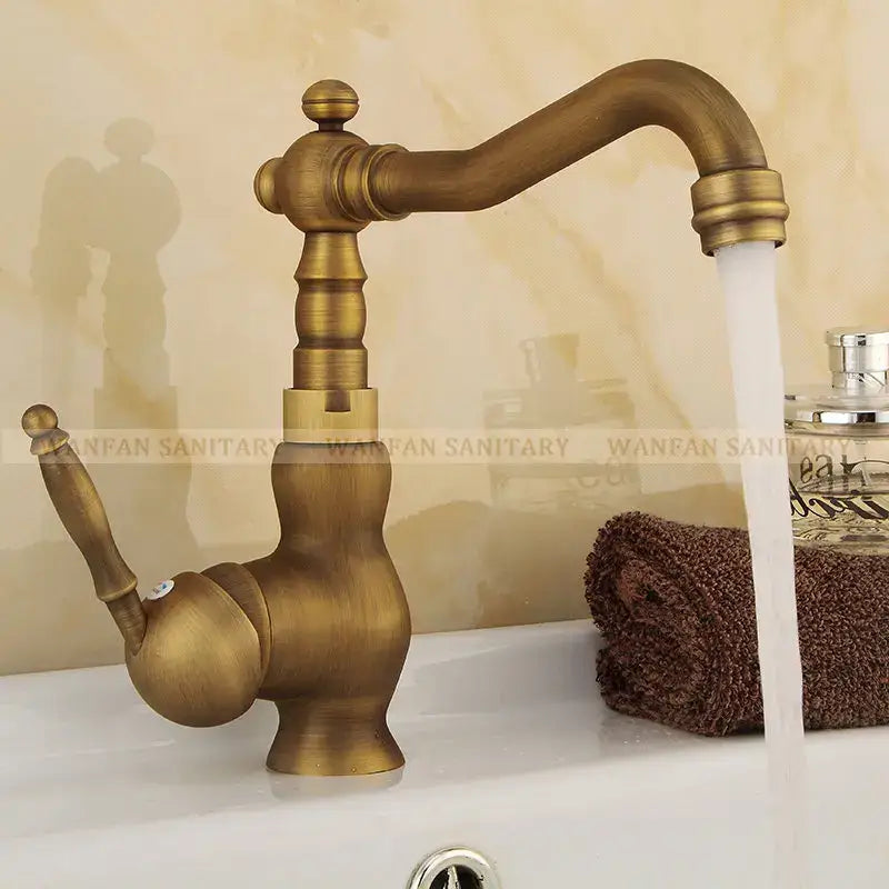 DecorBites™ antique brass bathroom sink faucet with swivel spout single handle and ornate vintage detailing