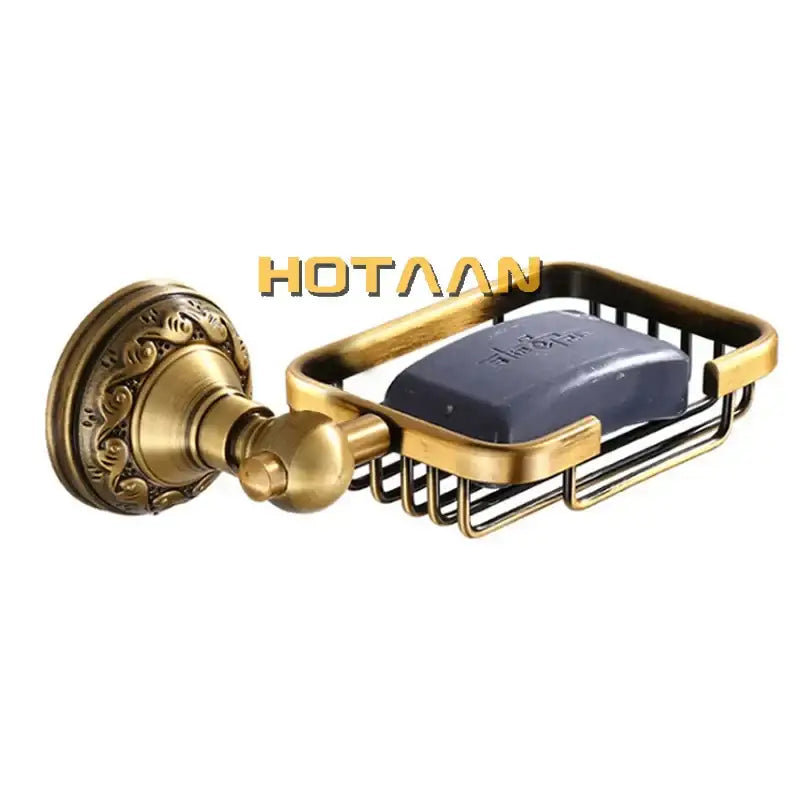 Decorbites™ antique brass soap dish holder with ornate scrollwork and wire mesh basket holding dark blue soap bar