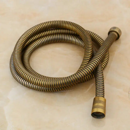 Antique brass bidet faucet wall mount with flexible brass spiral hose and textured ends for bathroom accessory use