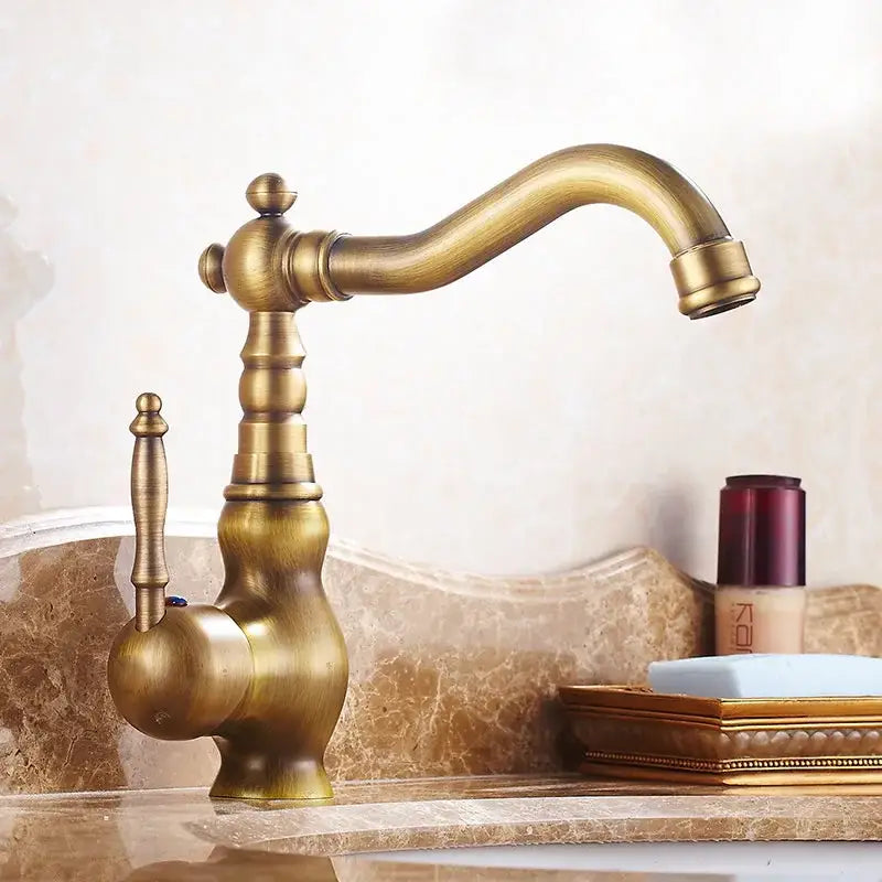 DecorBites antique brass ceramic basin faucet with ornate vintage design and curved spout for deck mounted sinks
