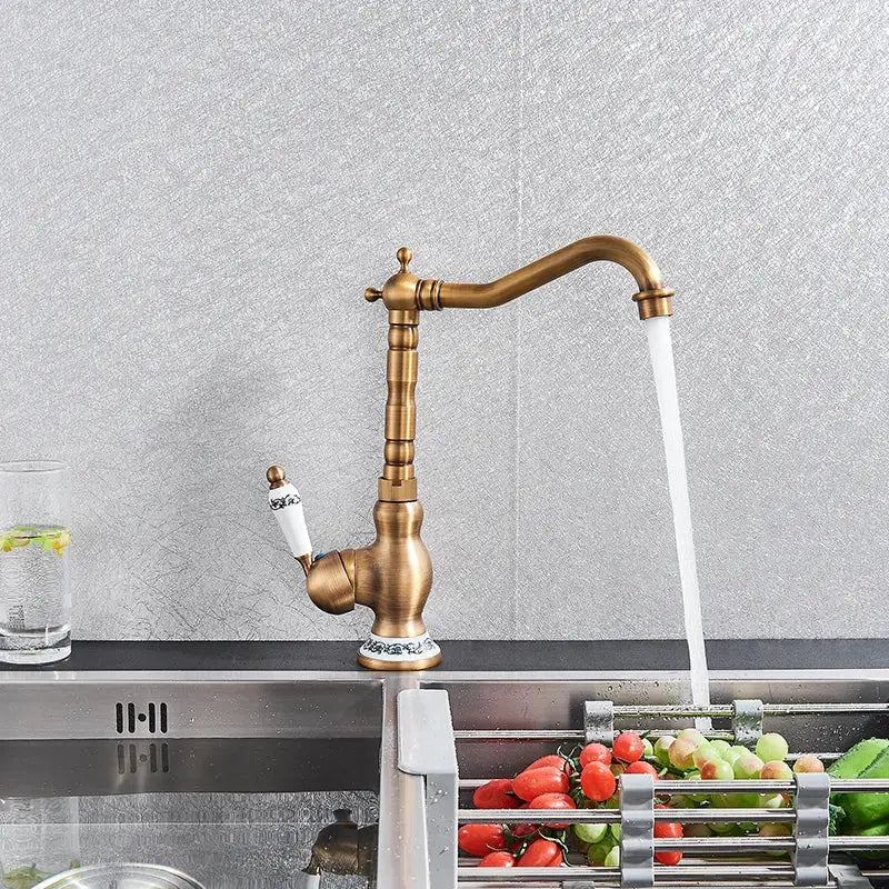 Decorbites antique brass ceramic handle basin faucet with curved spout for deck mounted kitchen sink mixer tap
