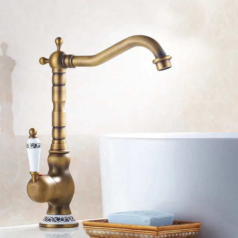 DecorBites antique brass ceramic basin faucet with white ceramic handle and black floral detailing for kitchen sink