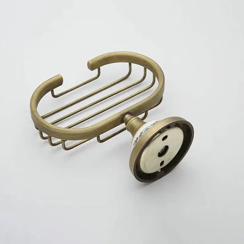 DecorBites antique brass ceramic soap dish with oval wire design and decorative base for bathroom accessories