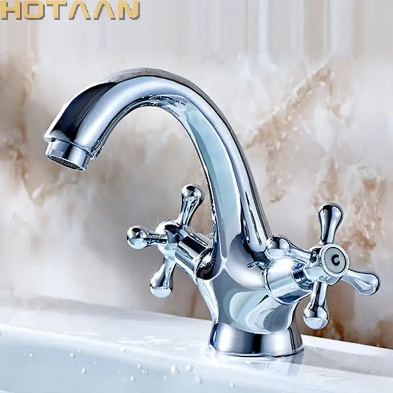 Chrome finished classic style basin mixer tap with two cross handles and curved spout for kitchen and bathroom