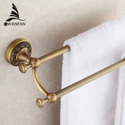 DecorBites antique brass double towel bar with ornate floral detailing on mounting plate and end caps for bathroom use
