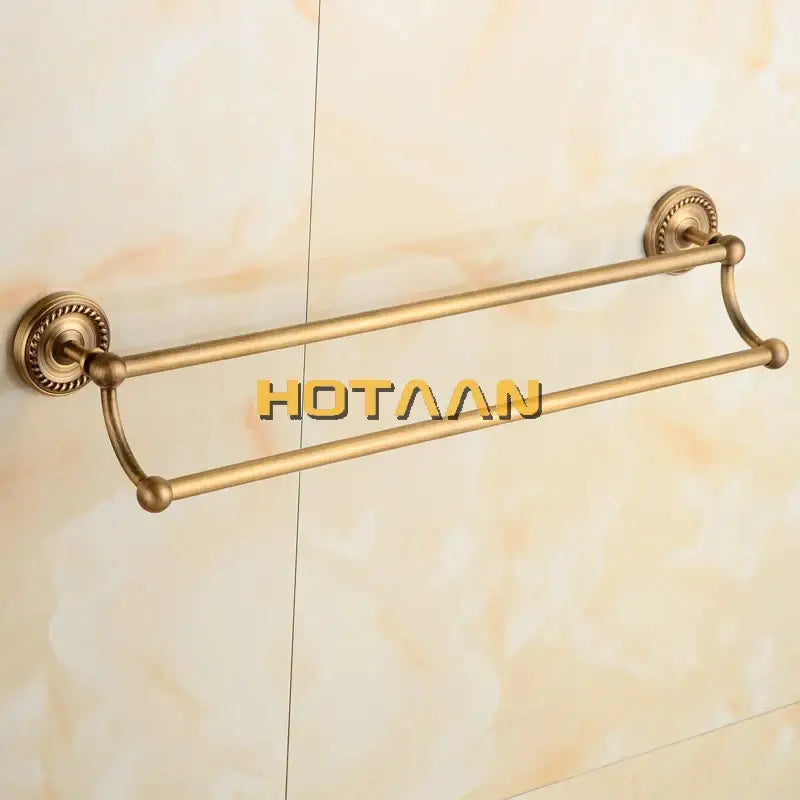 DecorBites antique brass towel bar rack with double tiers, ornate circular mounts, and solid brass construction
