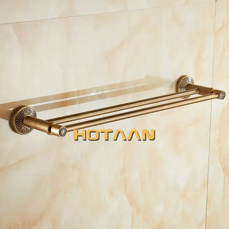 DecorBites antique brass double towel bar made of solid aluminium with ornate floral engravings and circular end caps