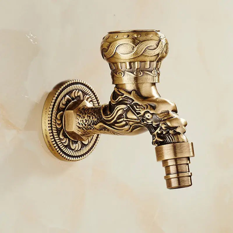 DecorBites™ antique brass dragon outdoor washing machine faucet with intricate carved dragon head and ornate swirling patterns