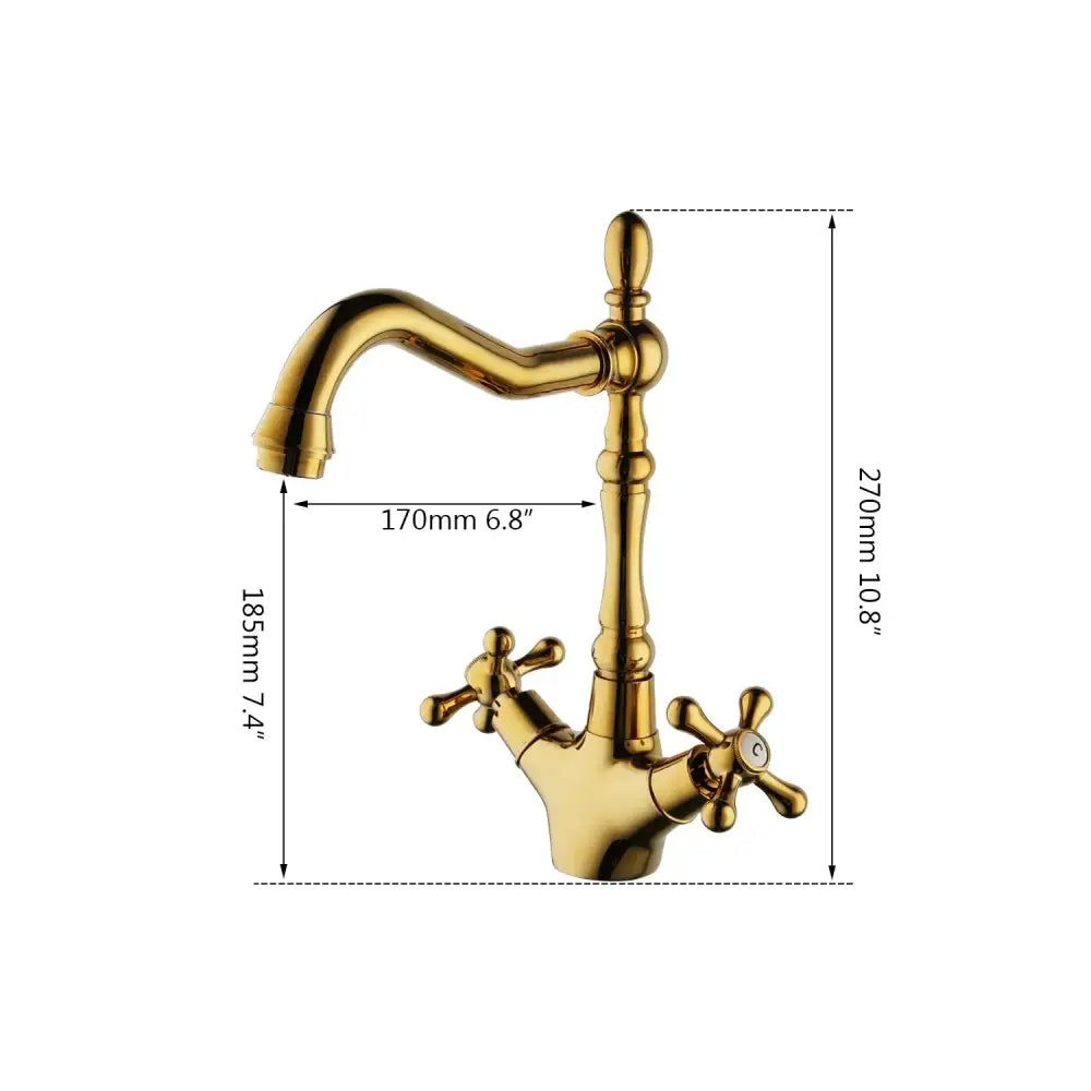Gold-colored antique brass dual handle kitchen faucet with ornate detailing and cross-shaped handles by DecorBites