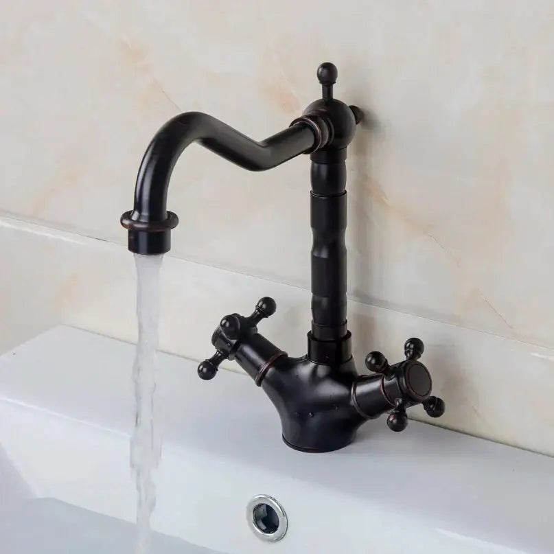DecorBites antique brass dual handle swivel sink faucet with curved spout and cross-shaped handles in bronze finish